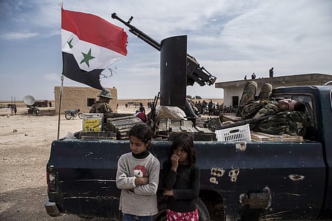 Syrian government forces deploy near the town of Tal Tamr, north Syria. (Photo | AP)