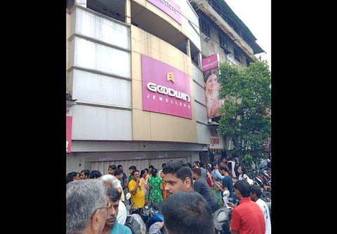 People gathered outside the Jewellery chain Goodwin. (Photo | Twitter)