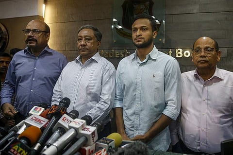 Bangladesh national cricket team captain Shakib Al Hasan (2R) speaks with media as Bangladesh Cricket Board (BCB) president Nazmul Hassan Papon (2L) stands next to him at the Sher-e-Bangla National Stadium in Dhaka. (Photo | AFP)