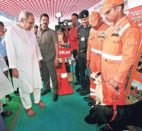 Chief Minister Naveen Patnaik going around the exhibition on disaster preparedness at Rabindra Mandap in Bhubaneswar on Tuesday | Express