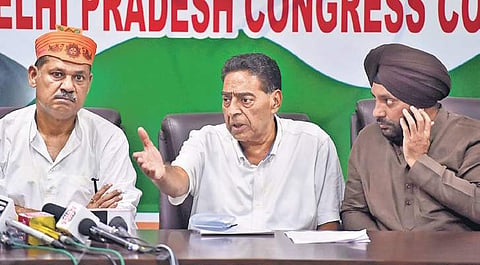 Subhash Chopra (C) with Kirti Azad and Arvinder Lovely. (Photo | PTI)