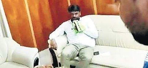 The tahsildars of Hassan district gathered in one of the rooms of the Inspection Bungalow for a party in Holenarasipur on Friday night | express