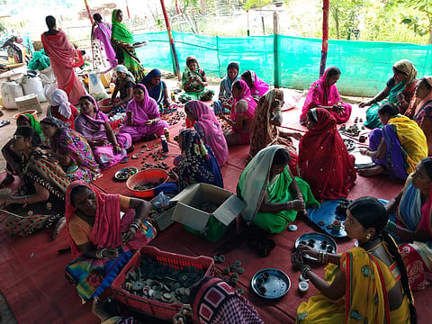 Women folk engage in preparing and giving final shape to 'diyas' in gauthan at Van-charauda. | (Photo | EPS)