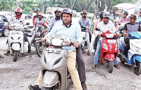Mayor Goutham Kumar hopped on to a  scooter for his first city  round on Sunday| Express