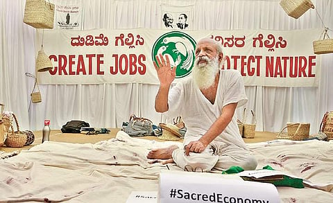 Theatre director and activist Prasanna takes part in ‘Hunger Sathyagraha’ at  Gandhi Bhavan premises in Bengaluru on Sunday | Shriram BN