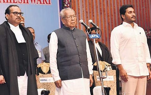 Justice Jitendra Kumar Maheshwari, Governor Biswabhusan Harichandan and  Chief Minister YS Jagan Mohan Reddy in Vijayawada on Monday | Express