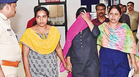Jollyamma Joseph being brought out of the District Crime Branch office in Vadakara to be produced before the Thamarassery court. ( Photo | EPS )
