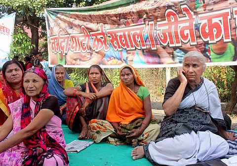 Social activist Medha Patkar along with villagers and dam oustees of Sardar Sarovar dam from Nimad region of Madhya Pradesh protests on the second consecutive day in front of Narmada Valley Development Authority office in Bhopal Sunday Nov. 17 2019. | (Ph