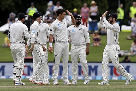 New Zealand's Kane Williamson, right, congratulates bowler Trent Boult  (File Photo | AP)