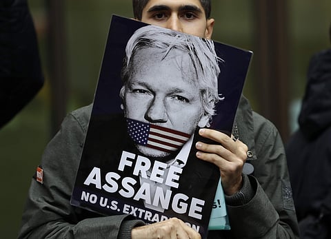 Supporters of Wikileaks founder Julian Assange demonstrate outside Westminster Magistrates' Court in London. (Photo | AP)