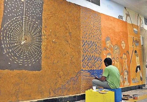The mud murals at the Metro station were made by more than 50  students from Srishti School of Art, Design and Technology