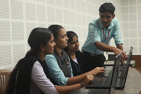Four Alva's College students who won laptops for their contribution to Kannada and Tulu wikipedia. (Photo | EPS) 