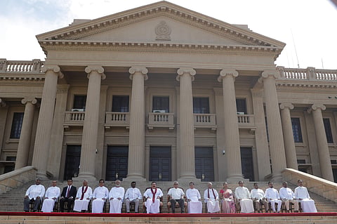 Sri Lankan president Gotabaya Rajapaksa with his new cabinet members in Colombo. (Photo | AP)