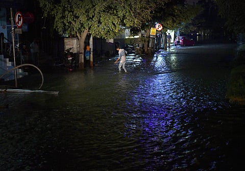 Hulimavu lake breached flooding the entire vicinity, including hospitals due to which electricity was pulled down to avoid electricution. (Photo | Meghana Sastry/EPS)