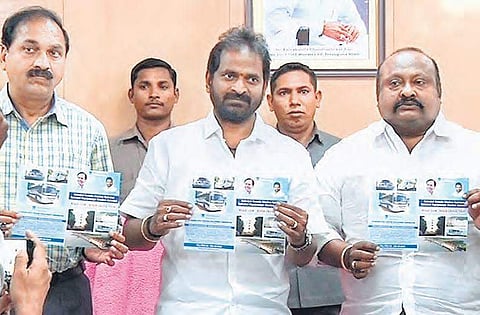 Tourism Minister V Srinivas Goud releasing the brochure for the Somasila-Singotam tour package at Ravindra Bharati in Hyderabad on Monday