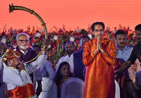 Shiv Sena President Uddhav Thackeray greets supporters during his swearing-in ceremony as the 18th Chief Minister of Maharashtra at Mumbai's Shivaji Park on Thursday. (Photo | PTI)