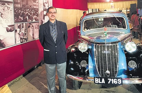 Pallab Roy with a vintage car