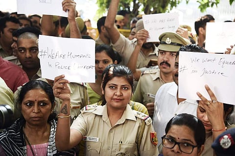 Delhi Police officials held protest against the recent attack by lawyers at the Police headquarters in New Delhi on Tuesday. (Photo | Parveen Negi, EPS)