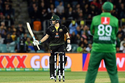 Steve Smith of Australia celebrates reaching half century (50 runs) during the second Twenty20 match between Australia and Pakistan at the Manuka Oval in Canberra. (Photo | AFP)
