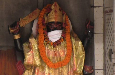 At the famous Shiv-Parvati temple in downtown Sigra, the faces of deities are  covered with masks. (Twitter Photo)