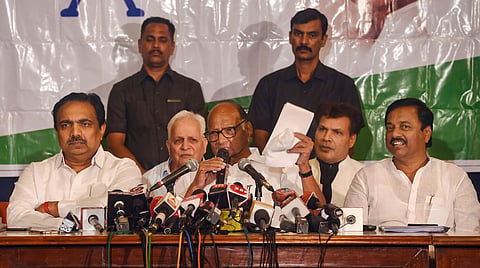NCP chief Sharad Pawar along with party leaders Jayant Patil and Sunil Tatkare addresses a press conference in Mumbai  (Photo| PTI)