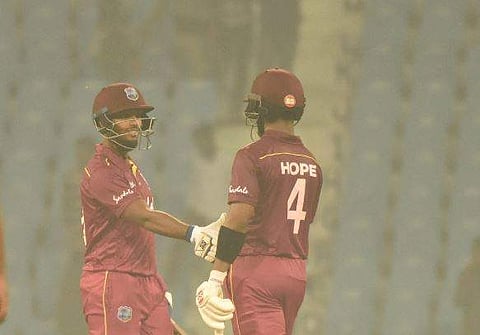 Shai Hope (L) and Roston Chase. (Photo | Twitter/@ACBofficials)