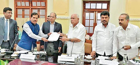 From left: Minister of State for Railways Suresh C Angadi, Secretary T M Vijay Bhaskar, Chief Minister B S Yediyurappa, Shivamogga MP B Y Raghavendra and Bengaluru Central MP P C Mohan at Vidhana Soudha, in Bengaluru on Tuesday