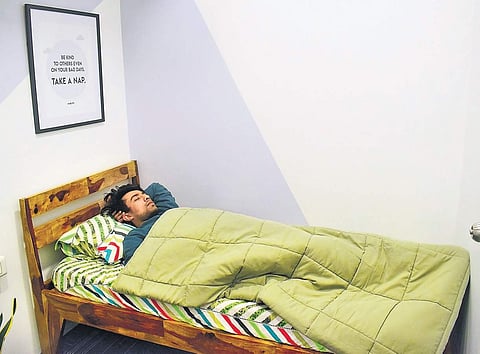 An employee of RentoMojo takes a nap at the office  Pandarinath B