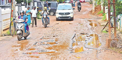 A pothole-ridden road in Kochi | FILE PIC