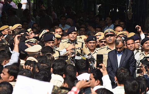 Delhi Police commissioner Amulya patnayak addresses  to police parsonnel  during a protest demonstration against the recent attack by lawyers at the Police headquarters in New Delhi. | (File | EPS)