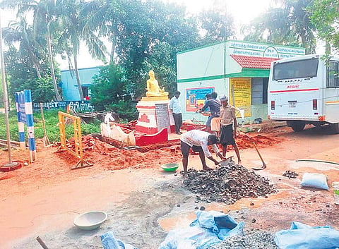 The work of constructing an enclosure for the Tiruvalluvar statue in Vallam  underway on Thursday. | (Photo | EPS)