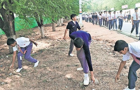 APS Bolarum students cleaning streets as part of ‘Swachhata Pakhwada’ programme held recently near the school’s premises