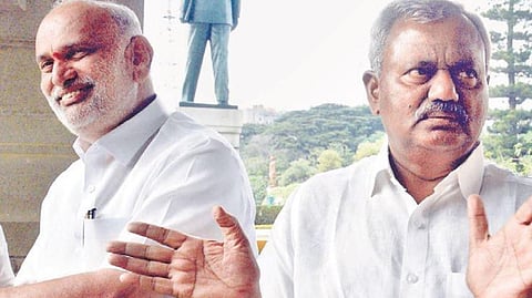 MLAs S T Somashekhar and Shivaram Hebbar at Vidhana Soudha in Bengaluru. 