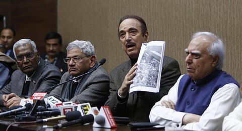 Senior Congress leader Ghulam Nabi Azad addresses a press conference condemning the alleged police action against students of Jamia Millia Islamia University and demanded a judicial inquiry into the incidents in New Delhi Monday. Congress leader Kapil Sib