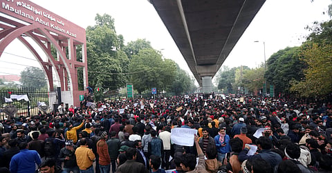 Jamia Millia Islamia University students gather for a protest against the Citizenship Amendment Act and Sunday's alleged police crackdown in the University in New Delhi on Monday December 16 2019. (Photo | Shekhar Yadav, EPS)