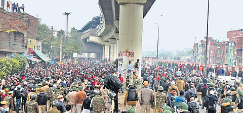 Police stop demonstrators from moving ahead at Seelampur in New Delhi on Tuesday