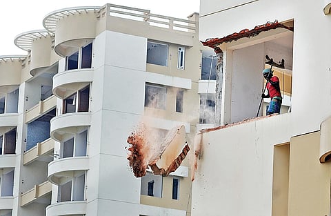 Partially-demolished flats of Alfa Serene towers|  File pic