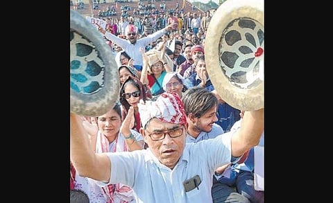 Guwahati residents protest against the CAA in Jalukbari area on Wednesday. (Photo | PTI)