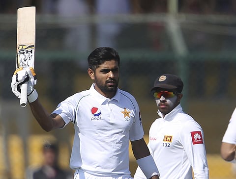 Pakistani batsman Babar Azam acknowledges his 100 against Sri Lanka. (Photo | AP)