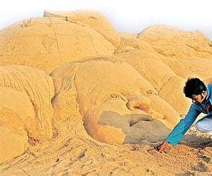 Sand sculptor Sudarshan Patnaik at Marina Beach in the city. (Photo |  D Sa/EPS)