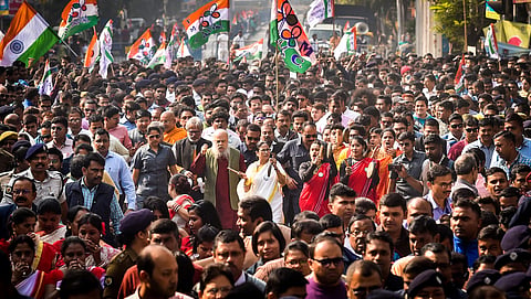 TMC Supremo and West Bengal chief minister Mamata Banerjee plays a musical instrument while leading a protest rally against the amended Citizenship Act and NRC in Kolkata Tuesday Dec. 24 2019. (Photo | PTI)