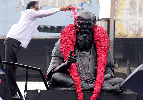 Floral tribute to Periyar EV Ramasamy statue during his death anniversary at Mount Road in Chennai on Tuesday. (Photo | R Sathish Babu/EPS)