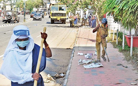 Sanitation workers cleaning the streets. (Photo | EPS /B P Deepu) | Image for representation