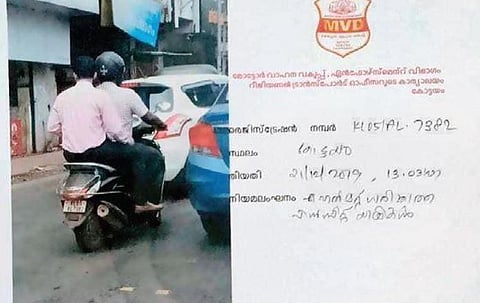 A notice sent by the MVD authorities to the owner of a bike asking him to remit fine for riding with a helmetless pillion rider