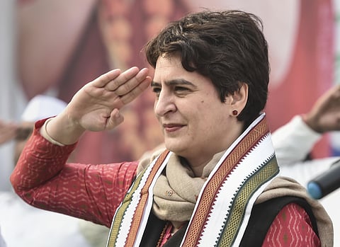 AICC general-secretary Priyanka Gandhi Vadra salute during the flag hoisting ceremony on party's 135th foundation day at UPCC HQ in Lucknow (Photo| PTI)