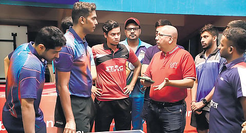Former national champion and coach Kamlesh Mehta (3rd R) interacts with  the Indian men’s table tennis team in Chennai on Friday | D sampathkumar