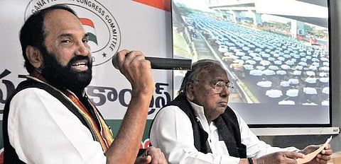 TPCC president Uttam Kumar Reddy (left) addresses the press the media at Gandhi Bhavan in Hyderabad on Friday. (Photo | Senbagapandiyan/EPS)