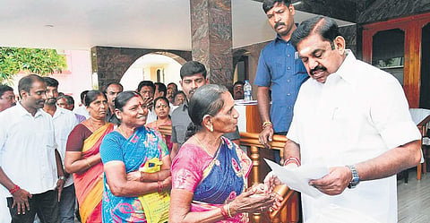 Chief Minister Edappadi K Palaniswami receiving petitions from the public in Salem | Express