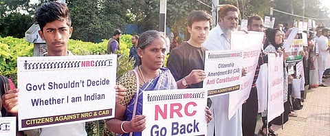 People staging a silent protest against NRC and Citizenship Amendment Bill at Tank Bund in  Hyderabad on Sunday  |  Sathya keerthi