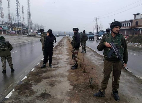 Indian paramilitary soldiers patrol near the site of an explosion in Pampore, Indian-controlled Kashmir, Thursday, Feb. 14, 2019. | AP